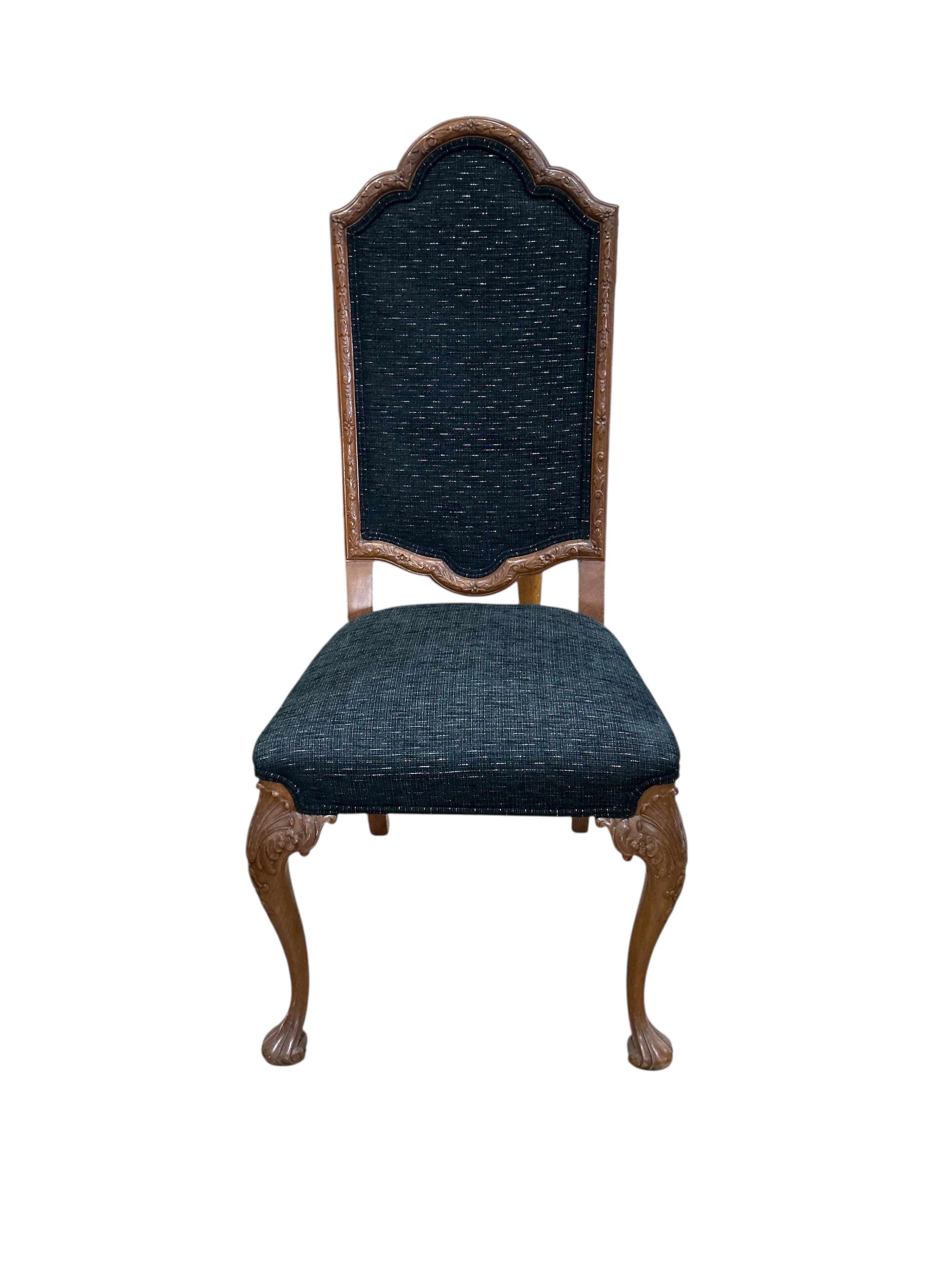 A Queen Anne Revival rectangular walnut dining table, width 210cm, depth 104cm, height 76cm together with six matching upholstered dining chairs